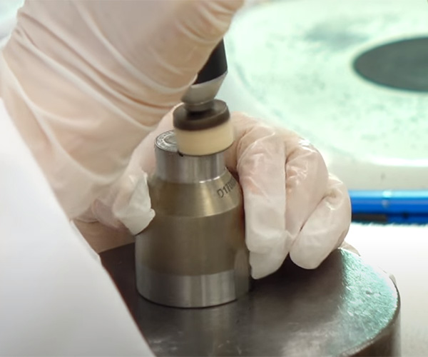 polishing a die using a rotary tool