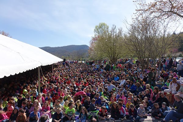 The crowd spills out of the tent at the launch ceremony.