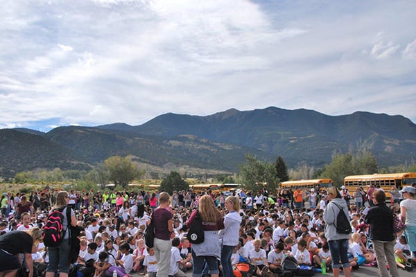 crowd gathered at the Great Sand Dunes quarter launch event
