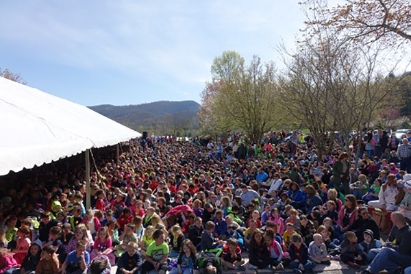 The crowd spills out of the tent at the launch ceremony.