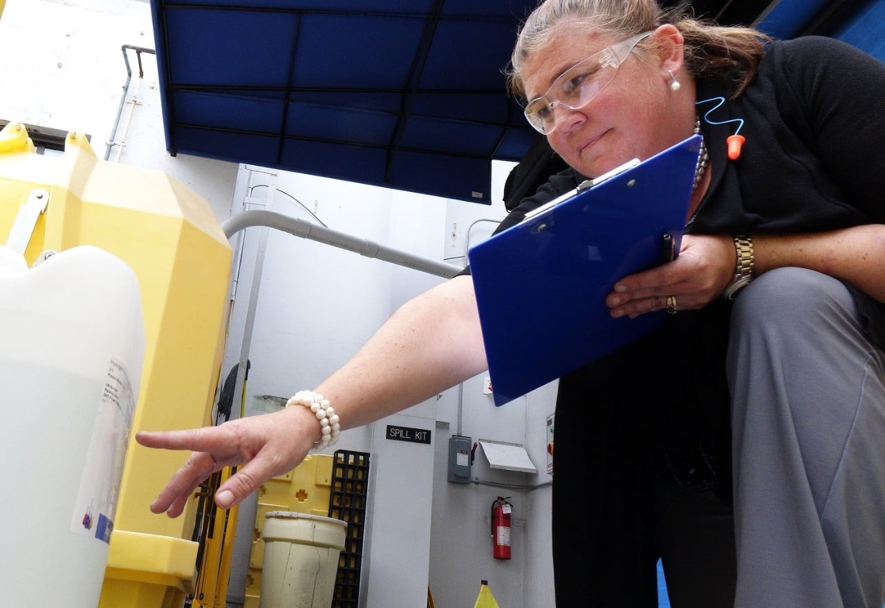 This image shows Susanne Turner performing her duties as Safety, Occupational Health & Environmental Manager at the U.S. Mint in San Francisco.