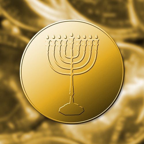 Piece of chocolate gelt with a menorah on the front