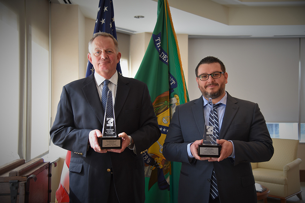 Director Ryder and Roger Vasquez hold trophies
