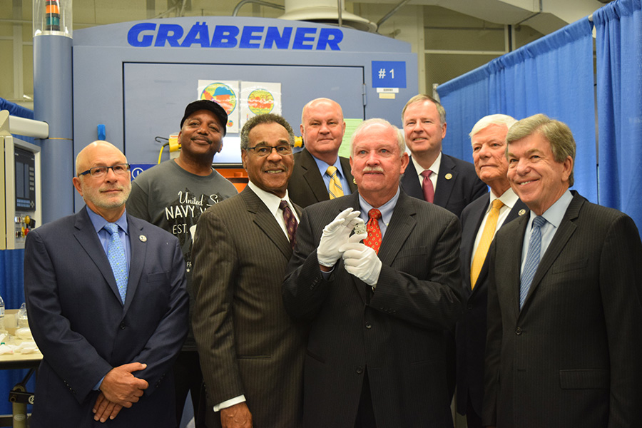 Gerald York, grandson of WWI hero SGT Alvin York, is joined by Mint and Congressional representatives.