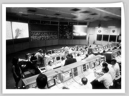 Overall view of the Mission Operations Control Room in the Mission Control Center, bldg 30, during the lunar surface extravehicular activity (EVA) of Apollo 11 Astronauts Neil A. Armstrong and Edwin E. Aldrin Jr.