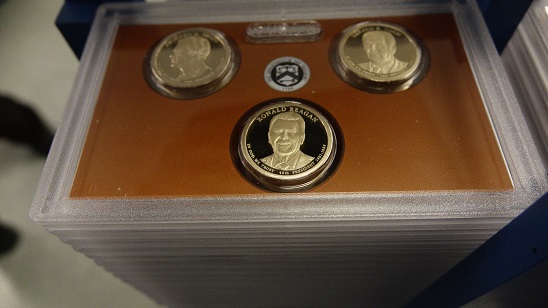 Stacks of 2016 United State Mint Presidential $1 Coin Proof Sets await packaging at the United States Mint at San Francisco.
