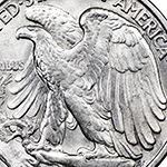 close up of eagle on walking liberty dollar reverse