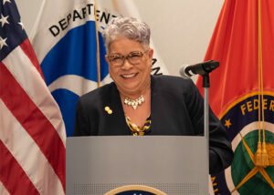 U.S. Mint Director Ventris C. Gibson at a podium